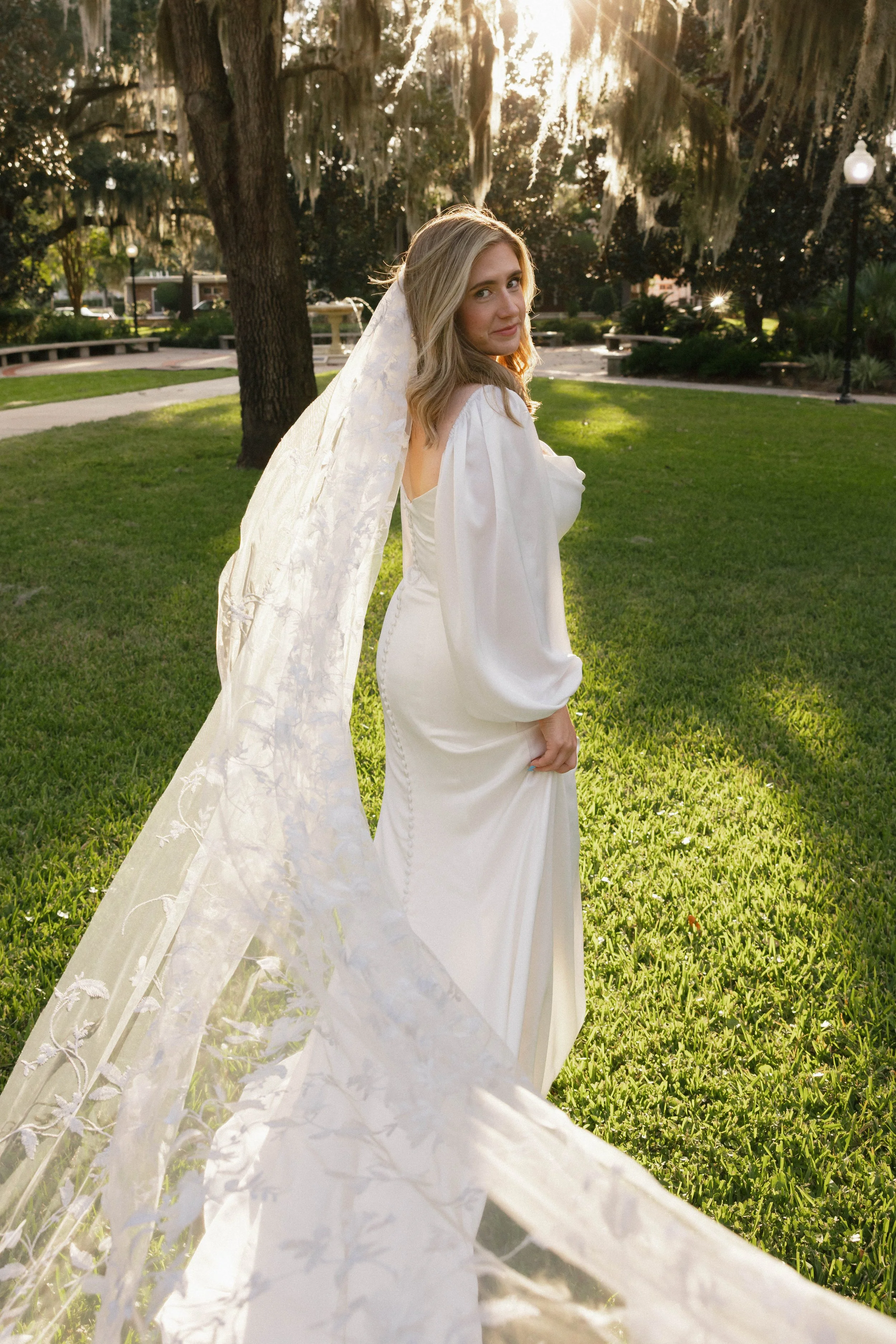 Gainesville Boutique Bridal Shop  Plus size inclusive Designer wedding gowns Ocala  Jacksonville  Wedding dress Florida  Alachua  Reception dress Graduation dress Little white dress Bride Veils Lgbtq friendly  salon north central florida