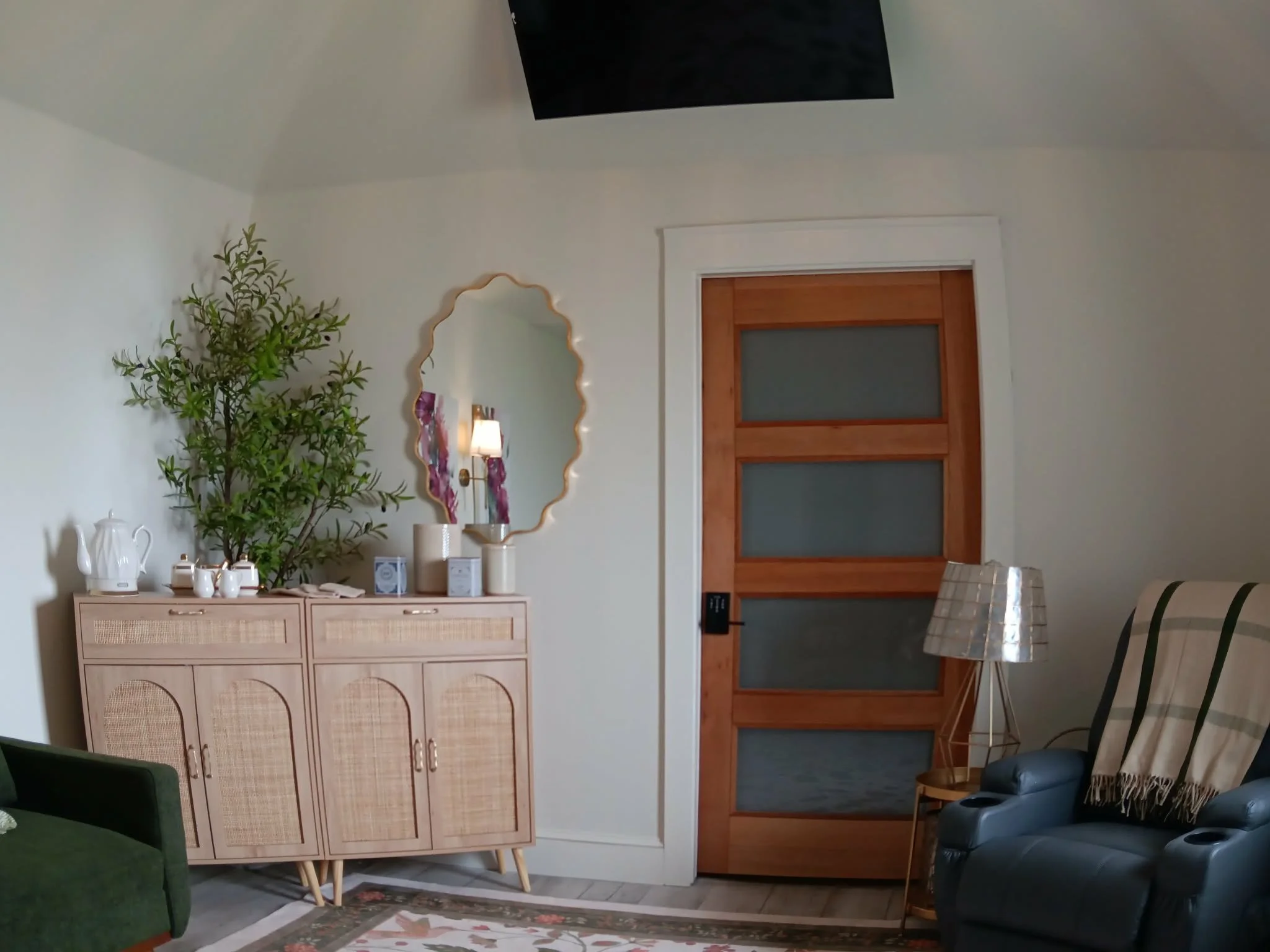 tea and scones cabinet next to massage chair.