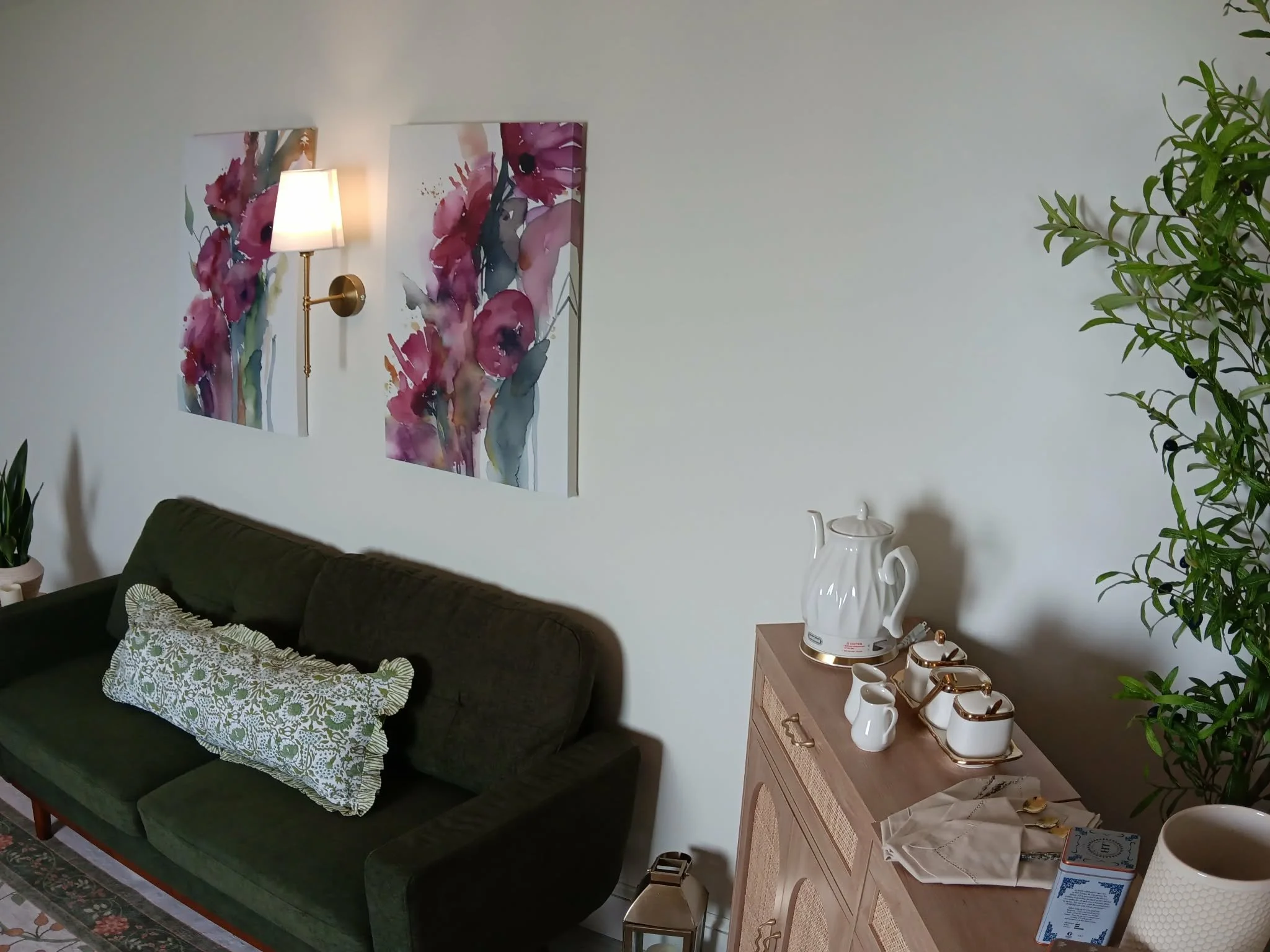 Tea, scones cabinet next to couch