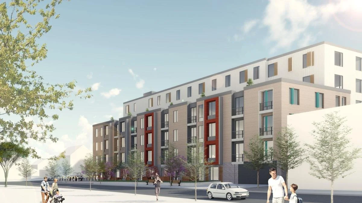 A modern multi-story residential building with trees and people walking in front.