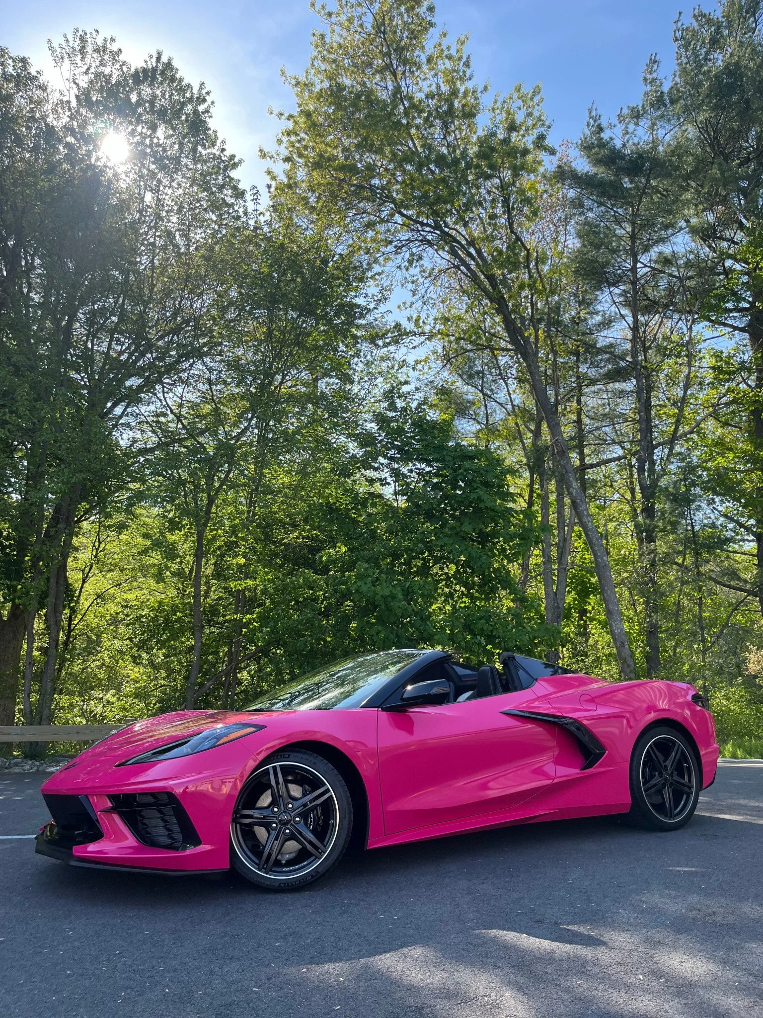Side profile of 2025 Corvette after full color change to Pool Party Pink vinyl