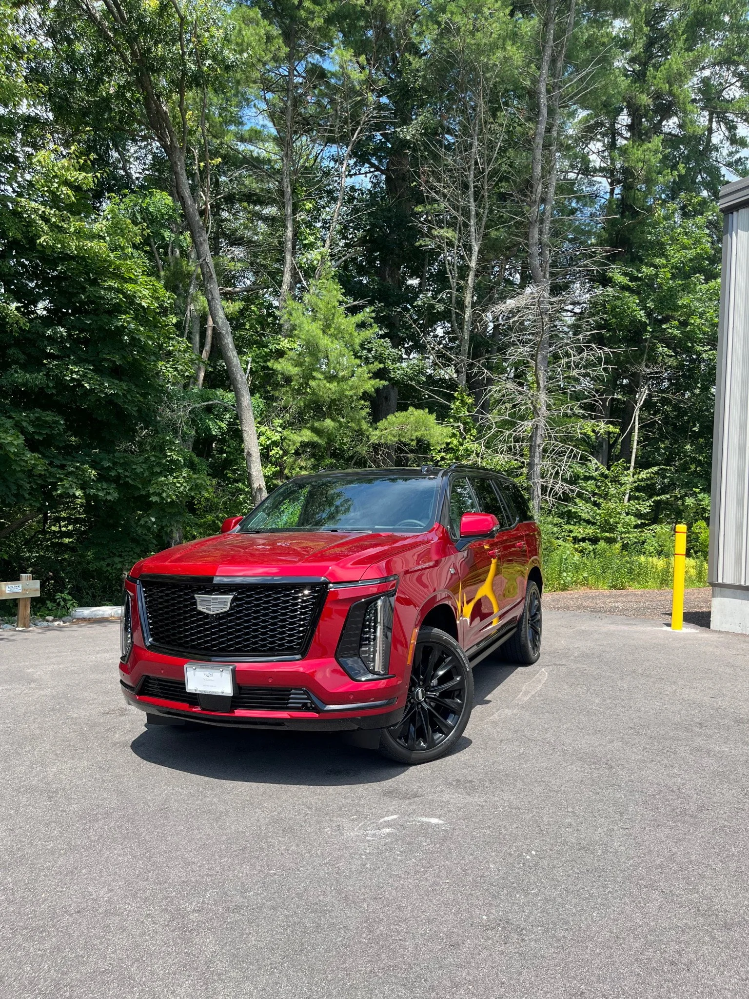 Cadillac Escalade with 3M High Gloss Black chrome delete and tuxedo wrap by Enigma Wraps