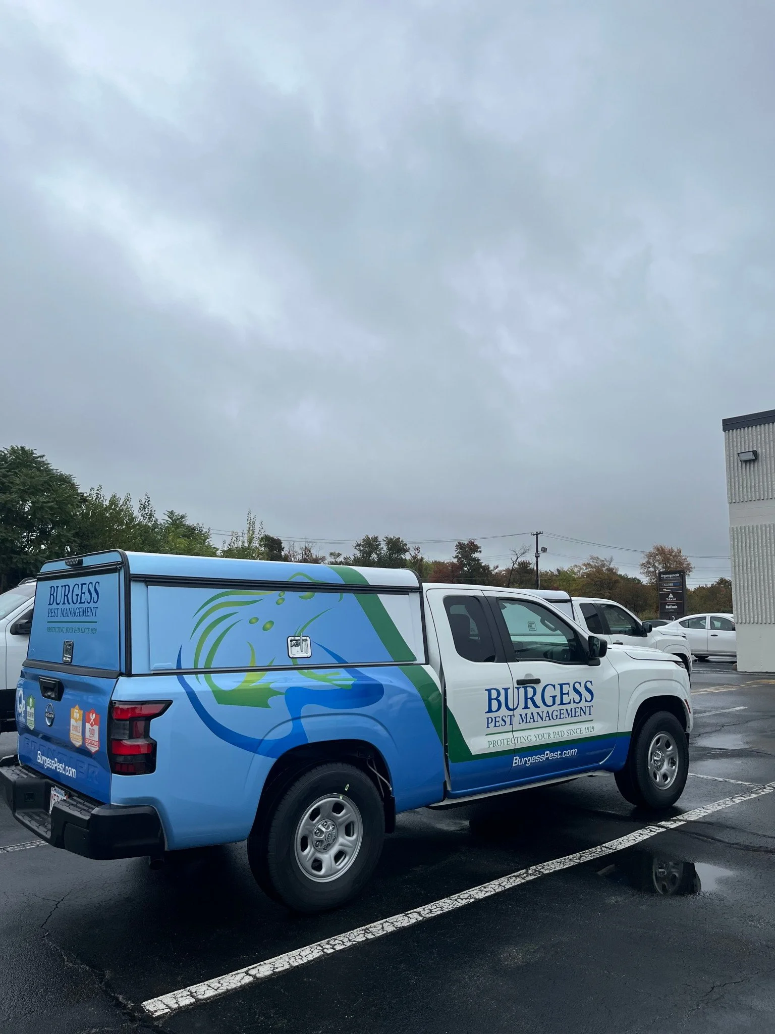 Nissan Frontier with partial commercial vinyl wrap featuring custom print and design by Enigma Wraps