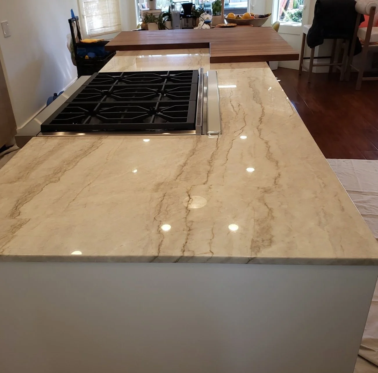 💎 Luxury That Lasts
This stunning residential kitchen features warm wood tones, bold backsplash tile, and pristine Taj Mahal quartzite countertops. We had the pleasure of prepping and polishing every surface to a perfect finish&mdash;enhancing the s