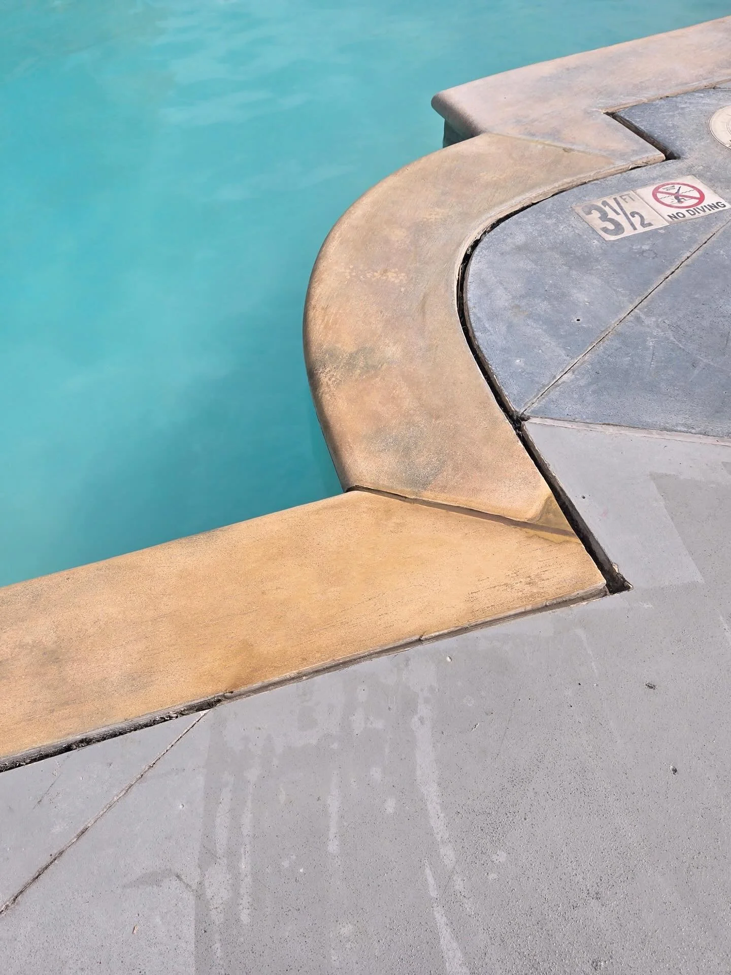 Cracked and separated pool coping repaired and restored back into place.

Years of exposure and movement had caused major cracking around the spa edge, but our team carefully rebuilt and blended the damaged sections to bring the area back to a clean,