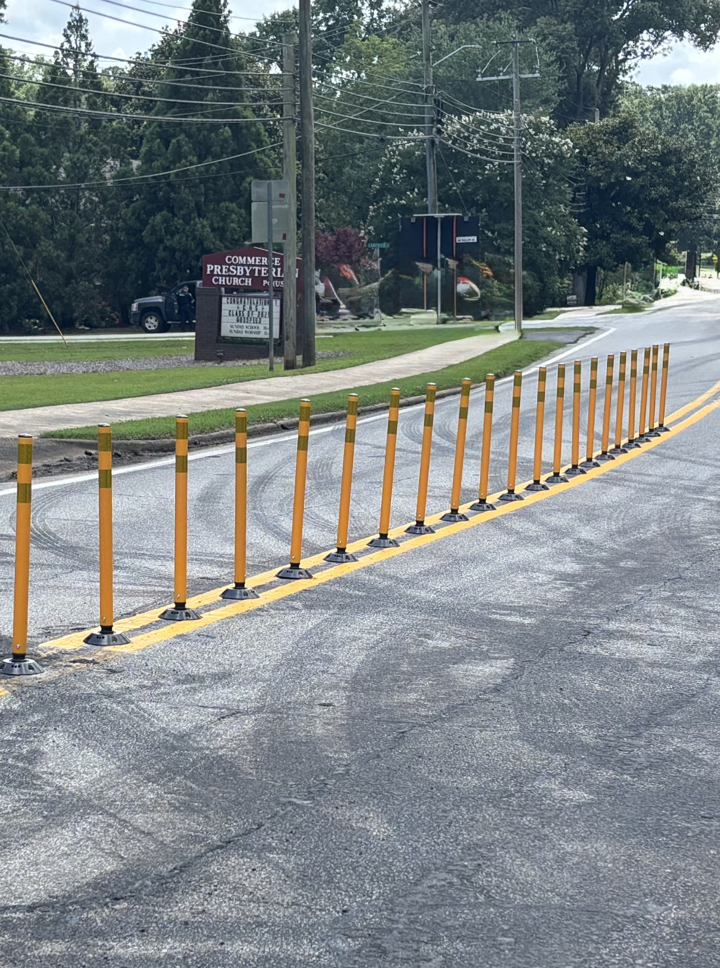 Installed delineators on road.