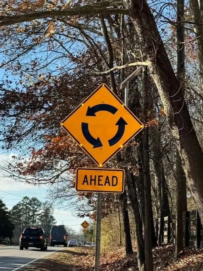 Solar-powered LED road traffic sign.