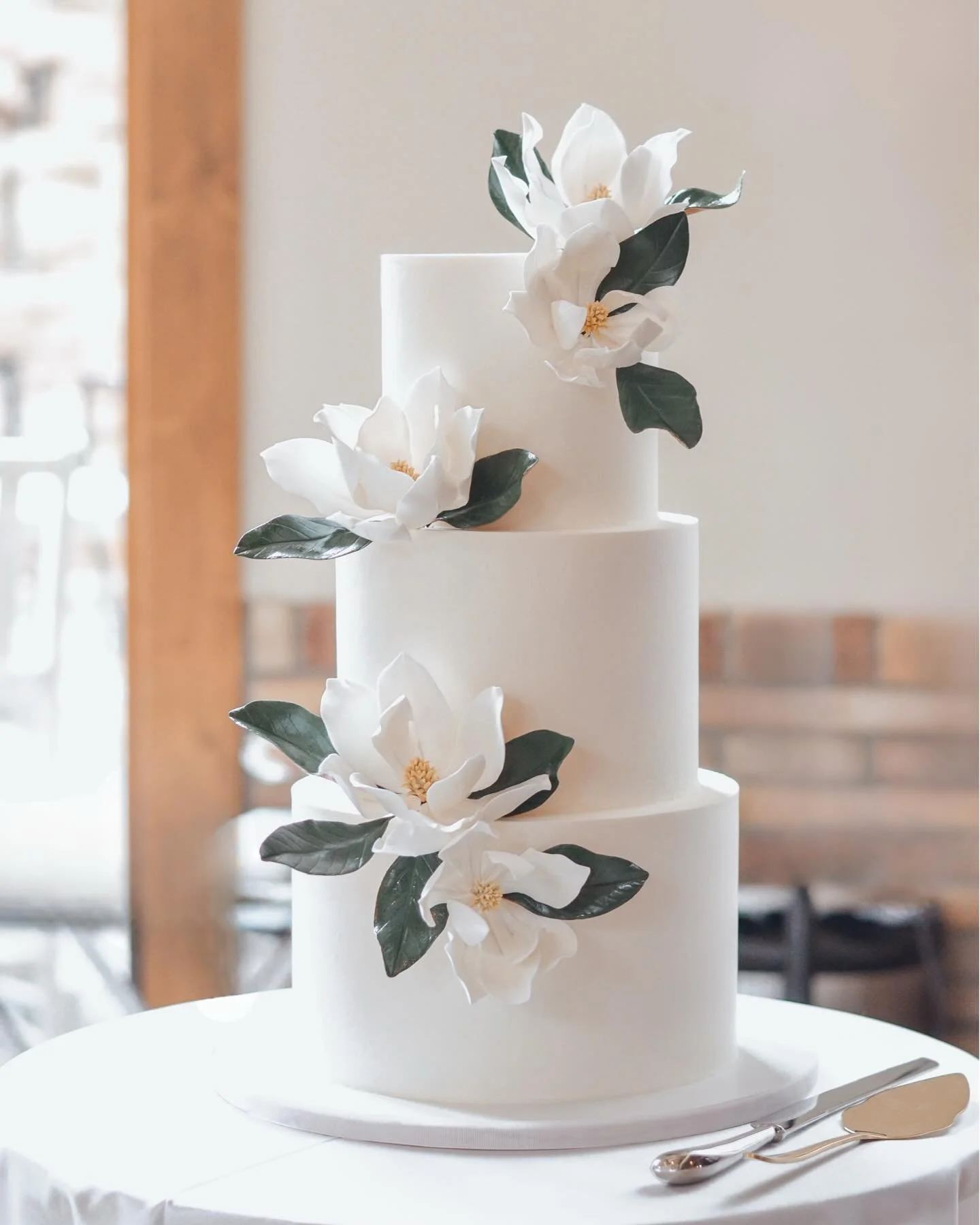 Beth &amp; Patrick&rsquo;s August wedding day brought classic chic to life.

Southern Magnolia sugar flowers adorned their 3-tier buttercream cake. Plus, guests enjoyed 7 dozen Magnolia sugar cookies that were each hand piped and painted.

@priveeven
