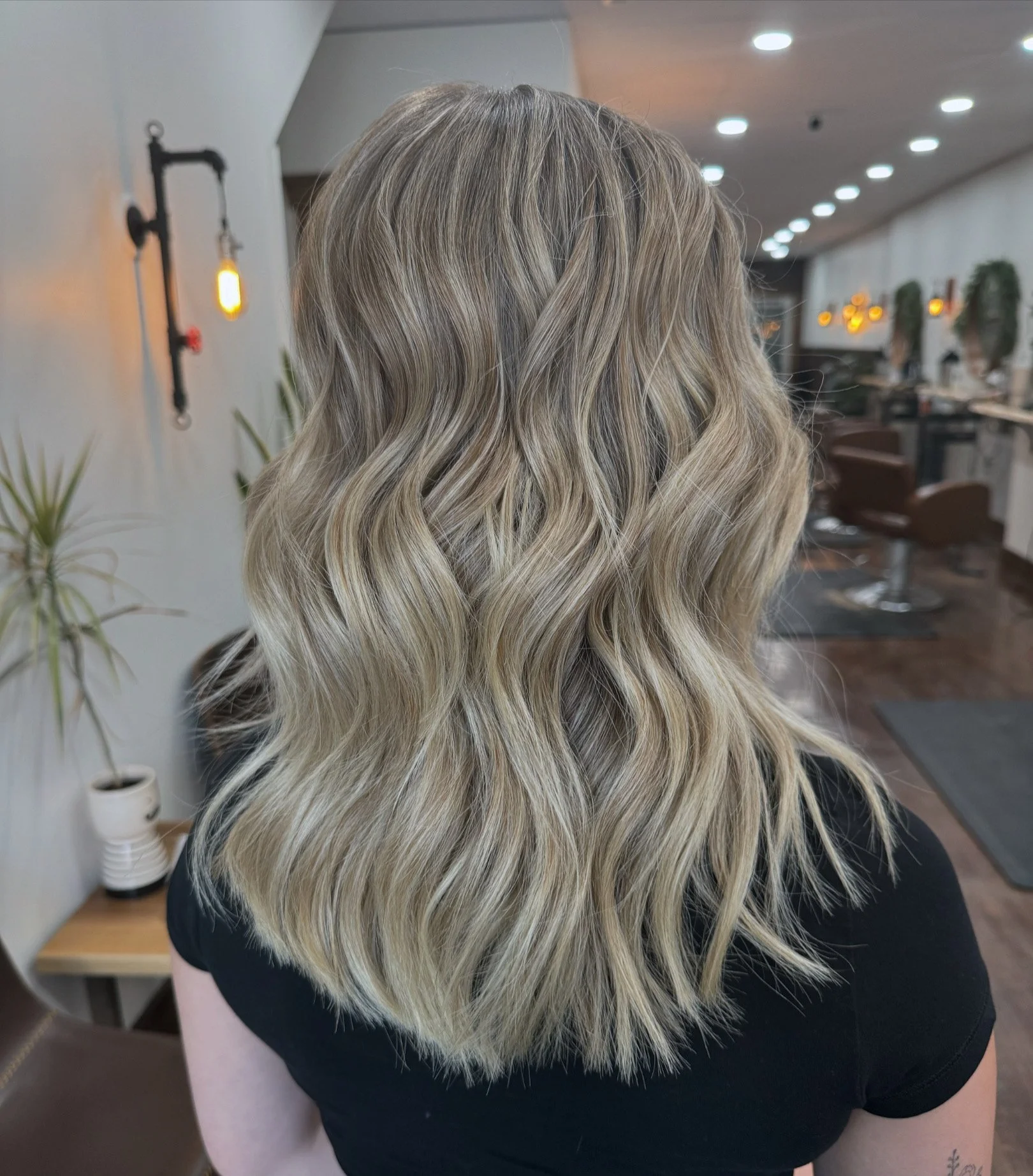 Salon customer with new long natural braids