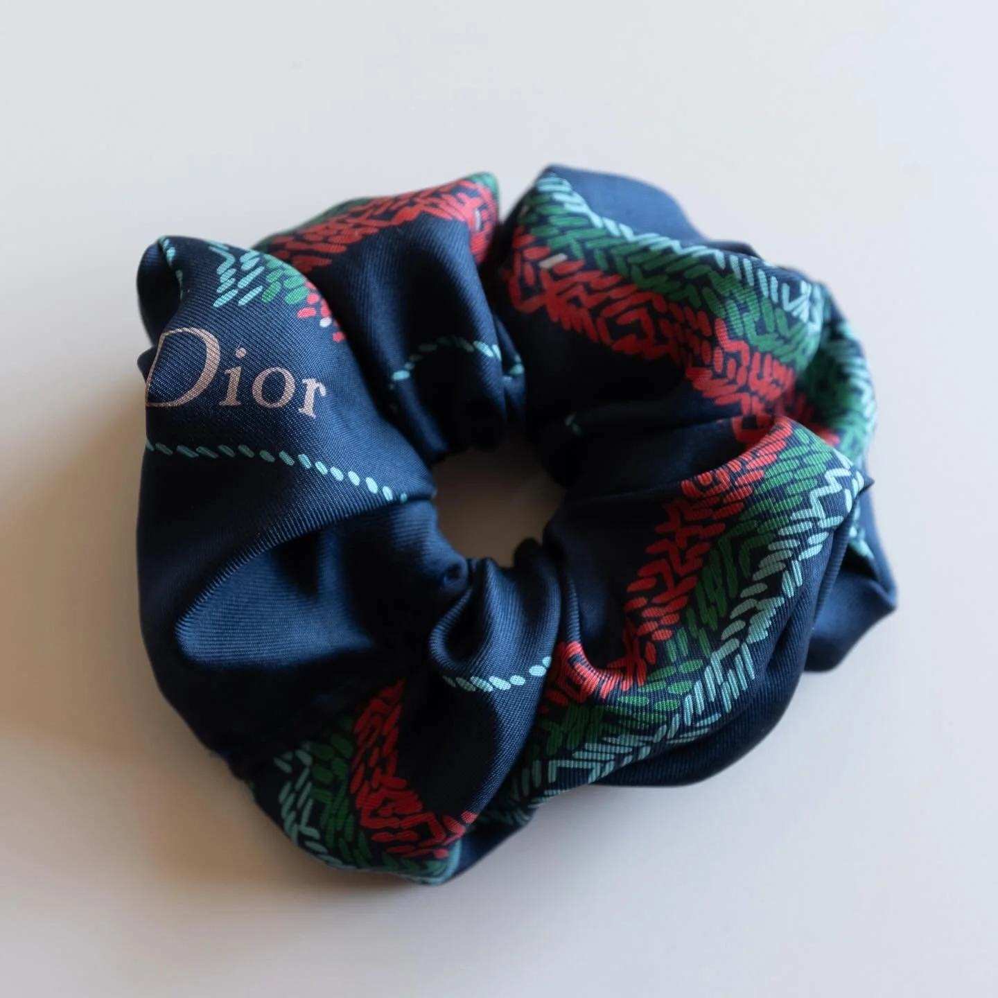 Vintage silk, reimagined. This one-of-a-kind scrunchie, made from an upcycled Dior scarf, is a love letter to timeless design and effortless beauty. ✂️✨ #NouerSilk #quietluxury
