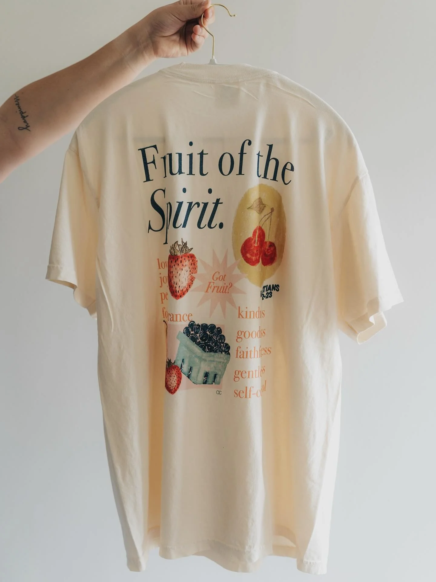 A shirt that is as meaningful as it is comfy and cute. We love that this piece is a conversation starter to get people talking about God! Our fave detail is the strawberry patch on the front &mdash; so sweet.