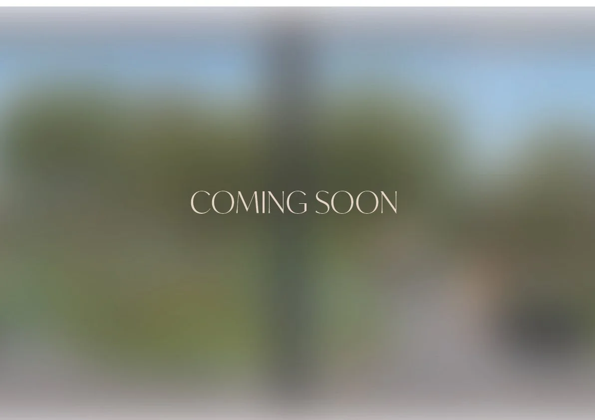 Blurry background with the text 'COMING SOON' in the center.
