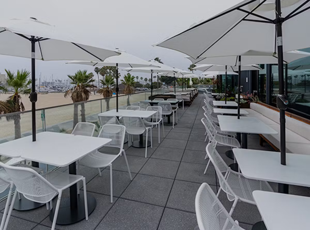 Open-air rooftop seating at Gaucho Beach
