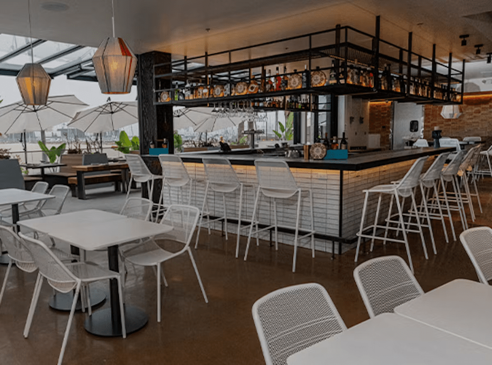 Restaurant seating and bar at Gaucho Beach