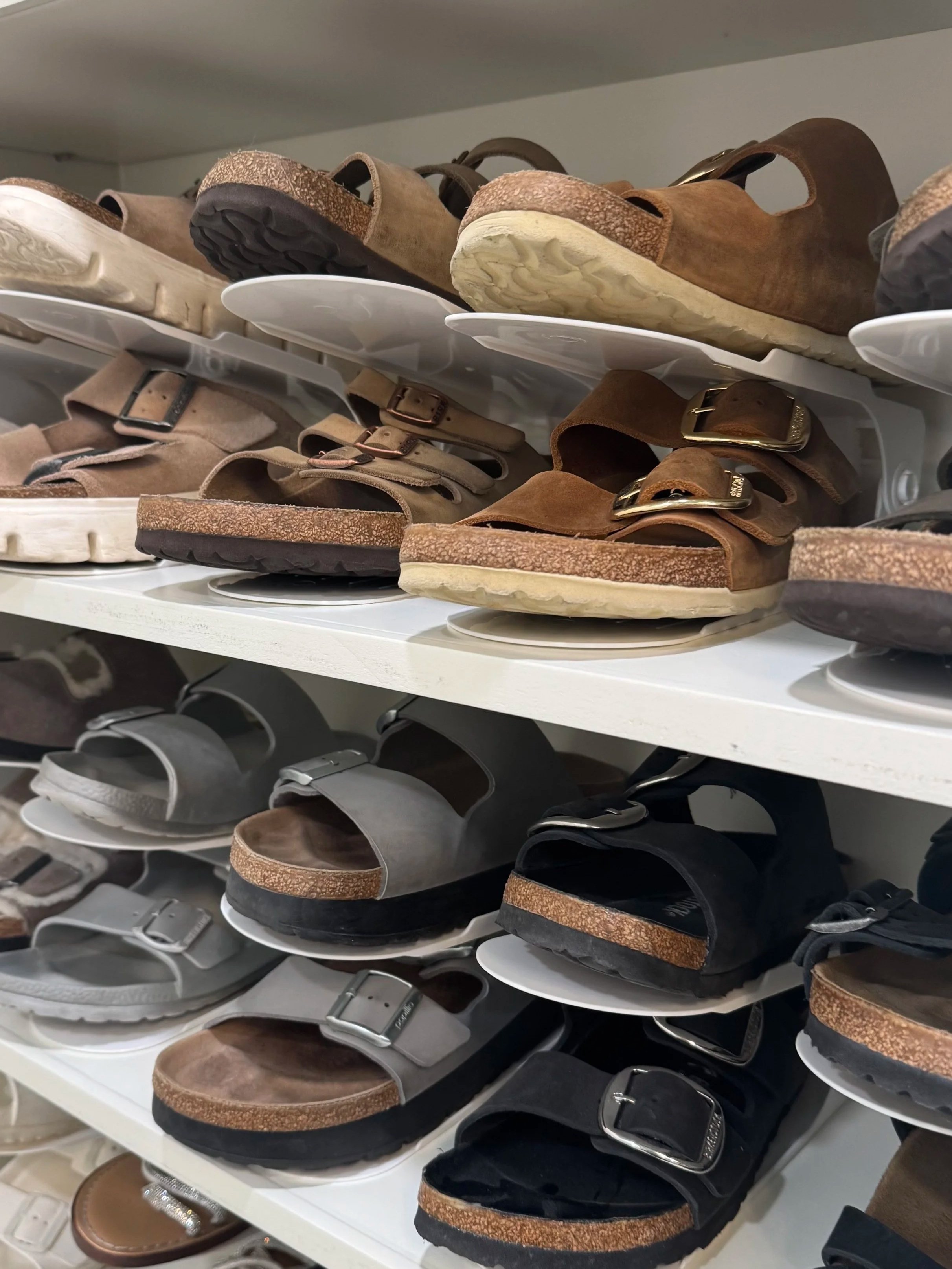 Shoe stacker organizers used to maximize space. Birkenstocks.