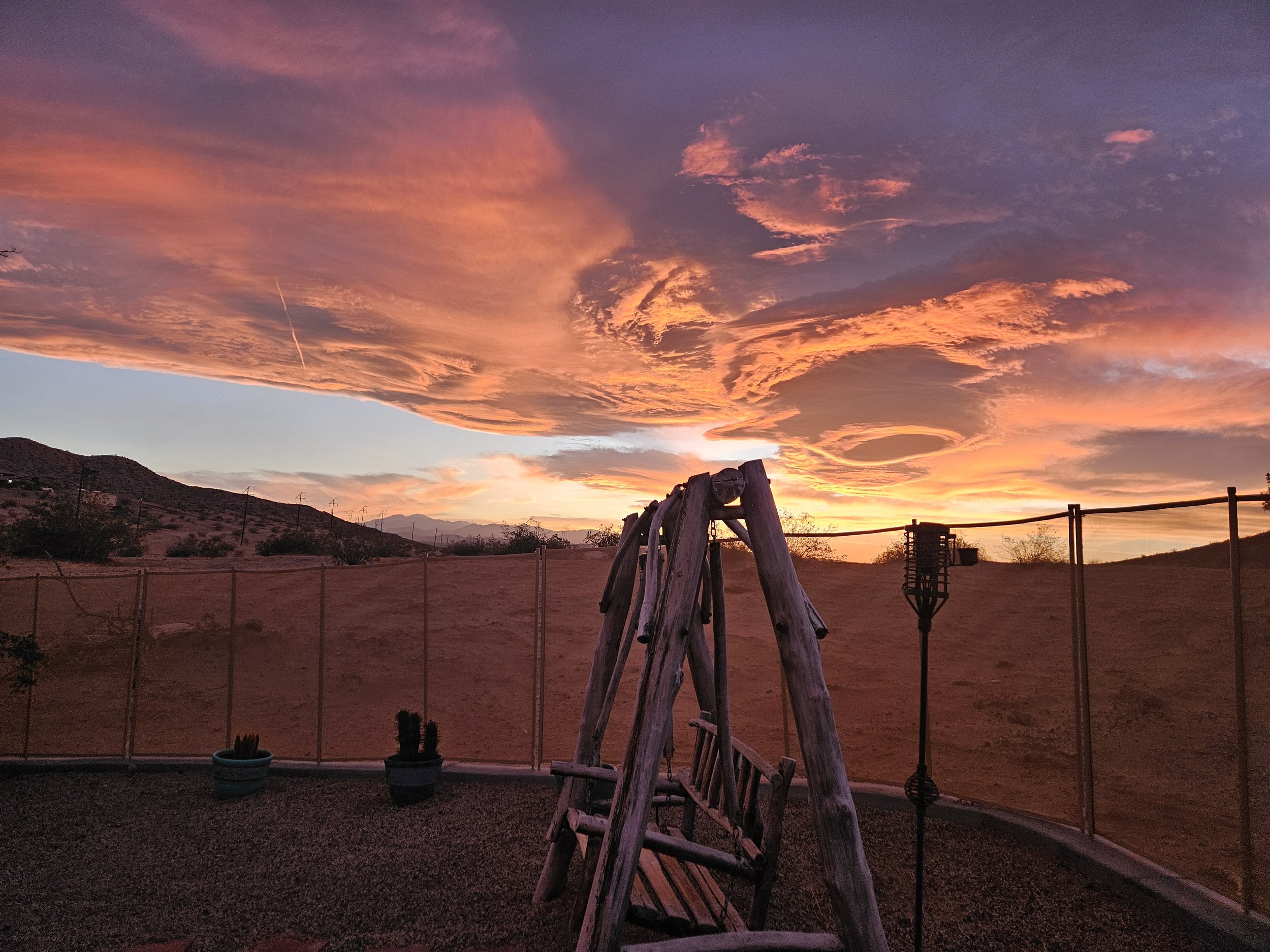 A local handcrafted wooden swing for a private space to reflect and breath.
