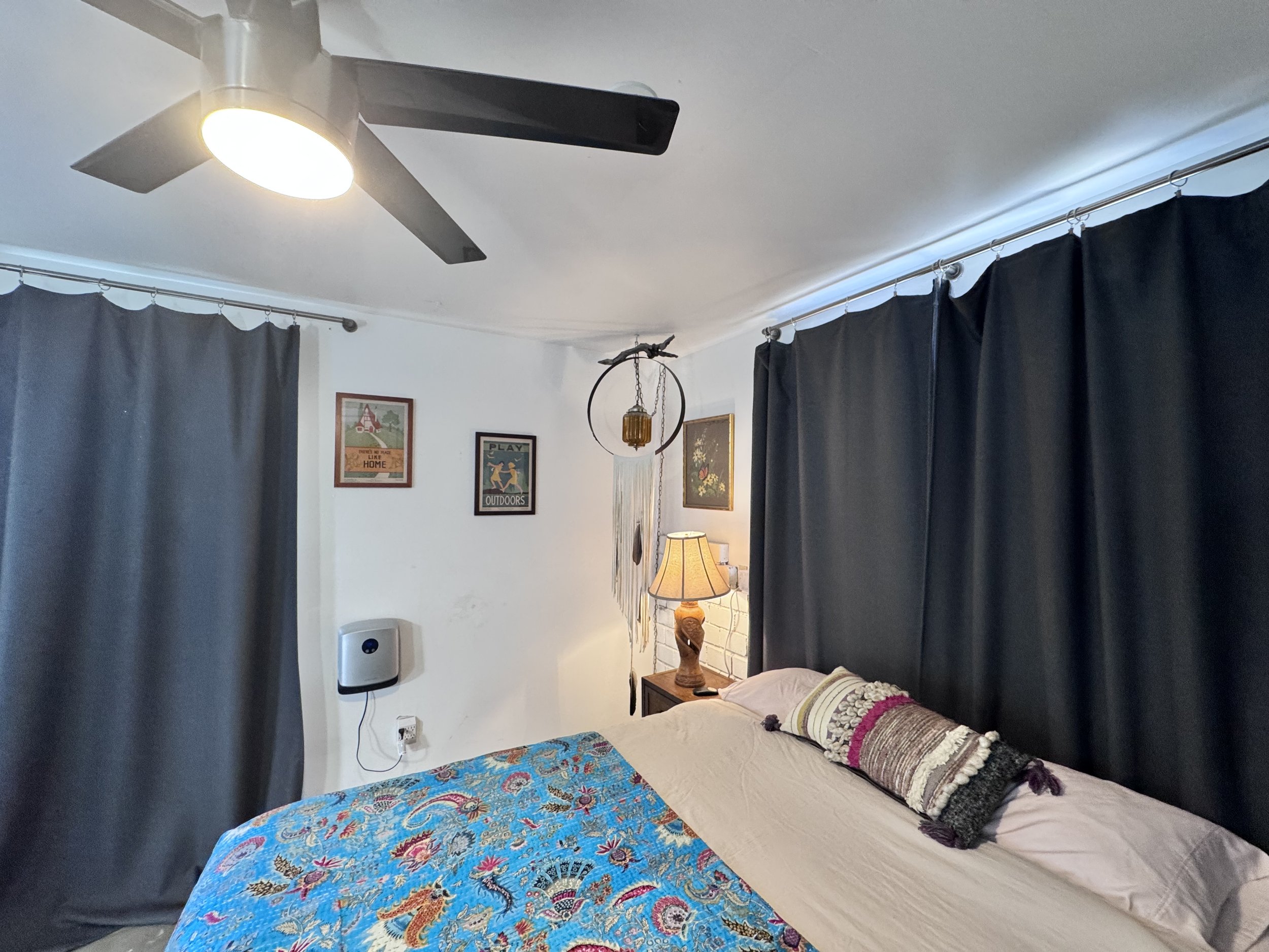 The Bungalita is a separate cottage with attached bath, queen bed, and private patio area.