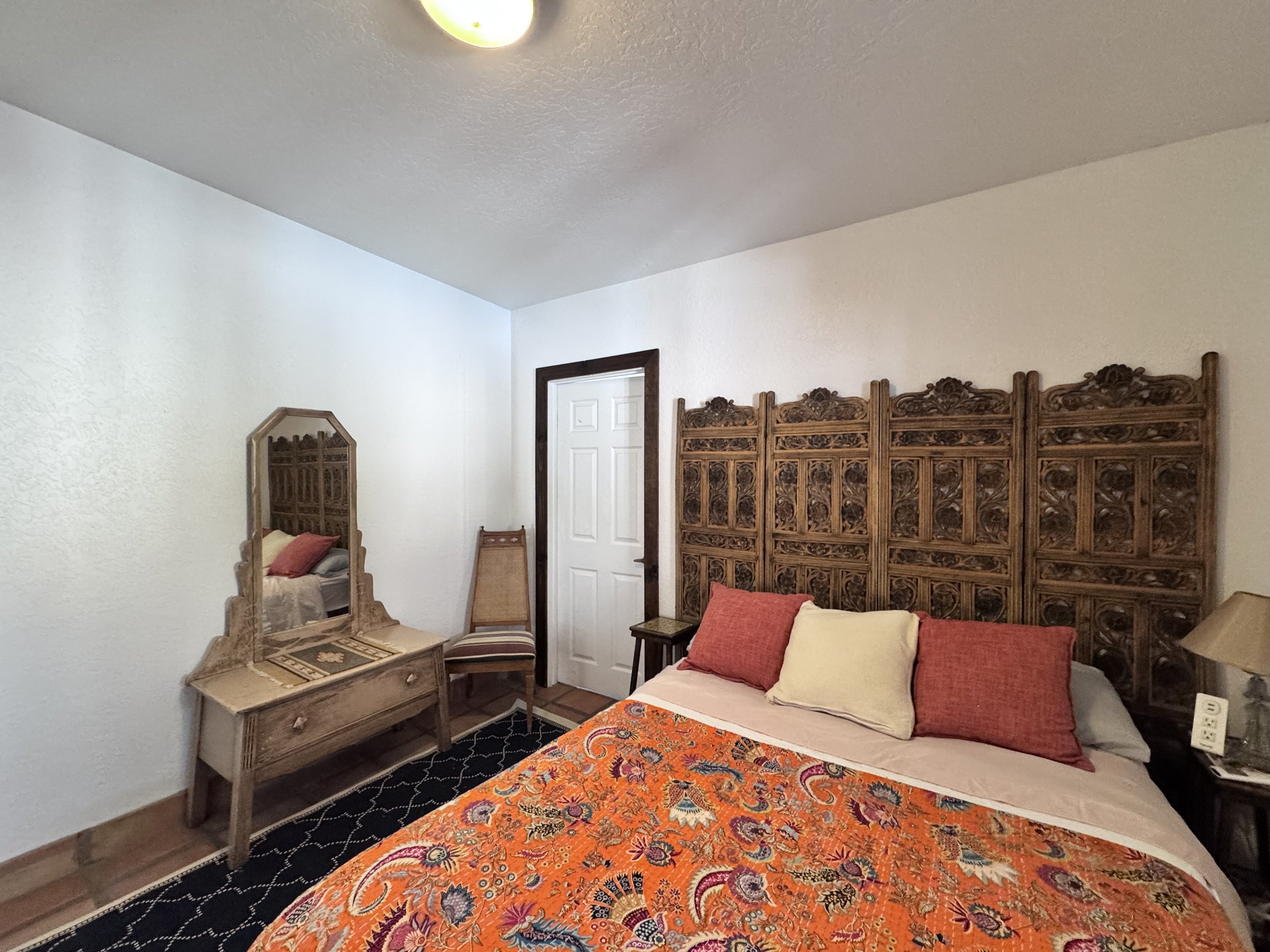 The Baja Room with queen bed adjoins the Cove Room