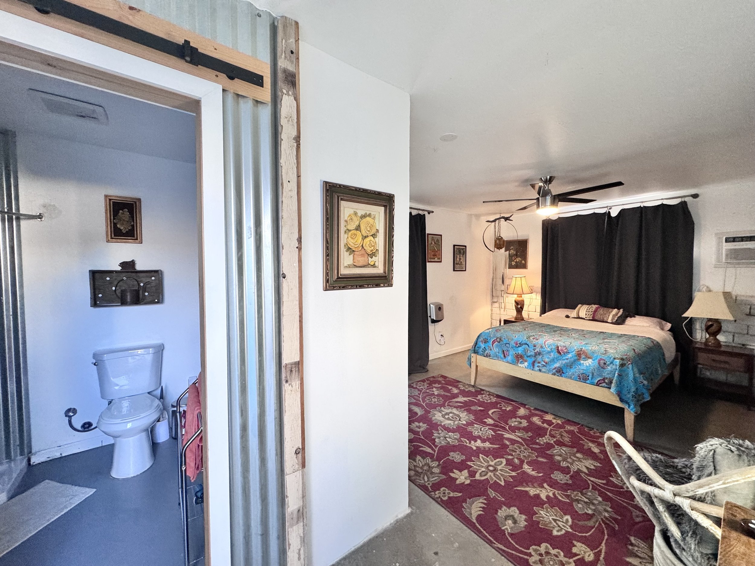The Bungalita is a separate cottage with attached bath, queen bed, and private patio area.