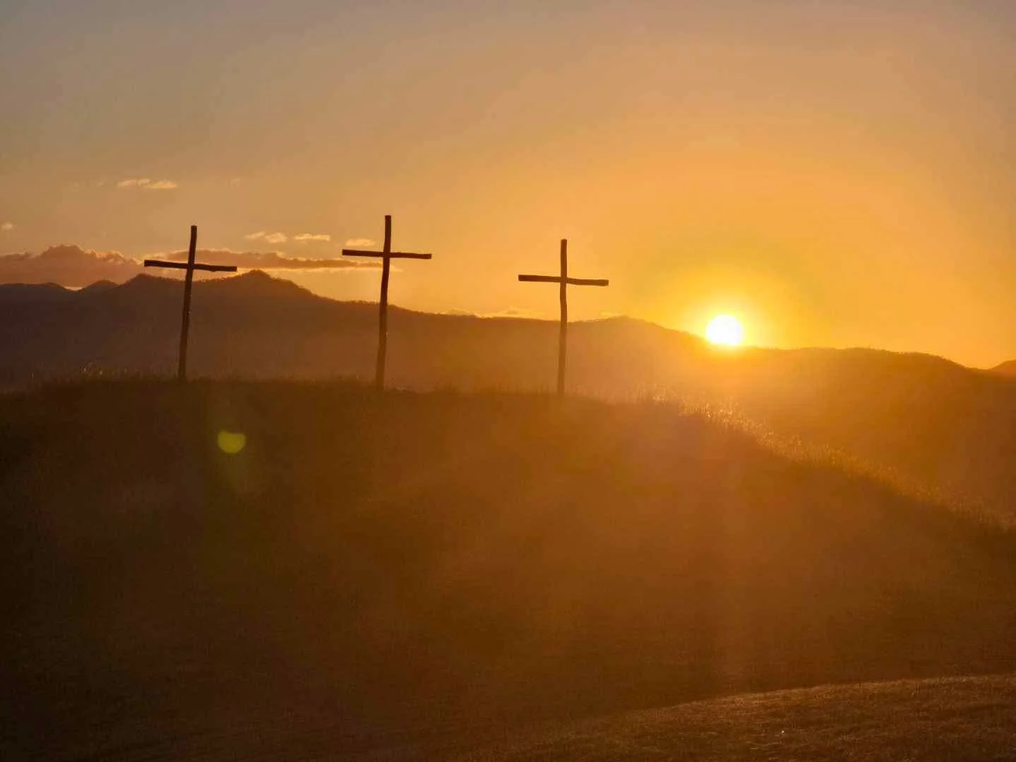 THREE CROSSES ON THE HILL