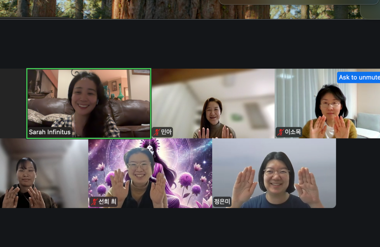 Screenshot of a video call with six women, some with hands raised, smiling, one with a mystical digital background.