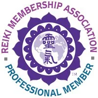 Logo of the Reiki Membership Association featuring a purple and teal circular design with Tibetan symbols and a meditating figure in the center.