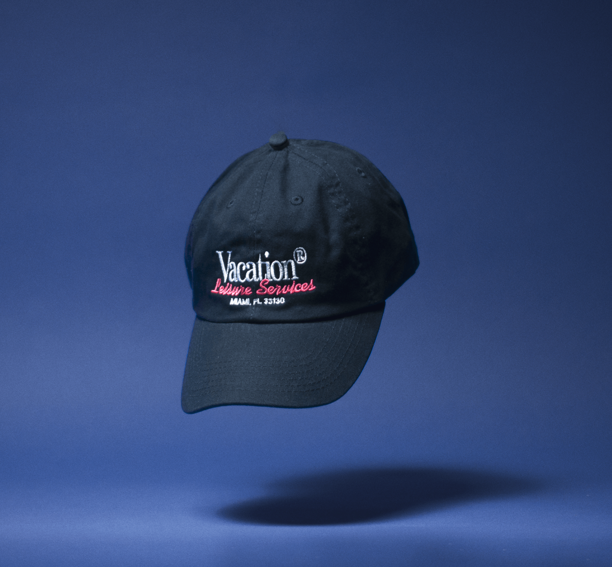 Vacation Leisure Services hat in navy with embroidered logo