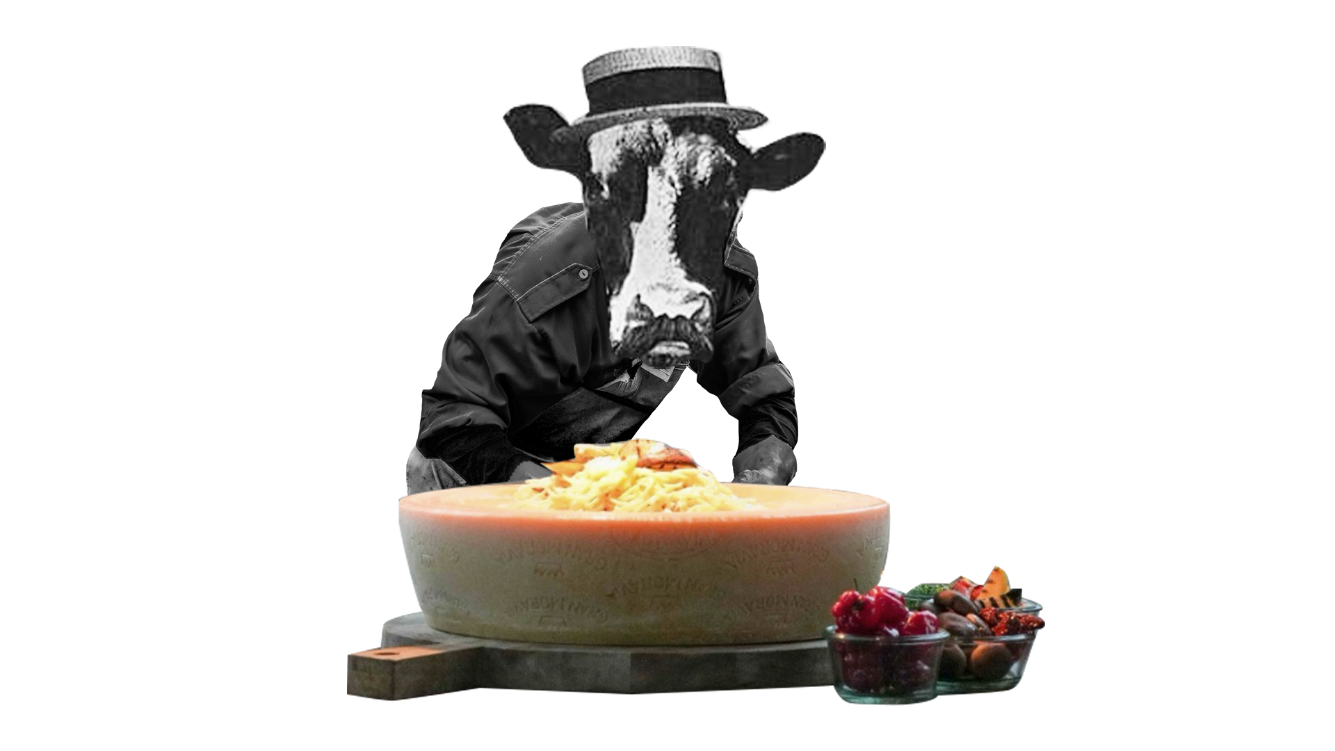 Ein ganzer halber Parmesan Käse mit Spaghetti gefüllt und eine Schale mit Antipasti und  anderer Toppings, dahinter  eine Figur mit einem Kuhkopf, die  einen Hut und eine KochJacke trägt.