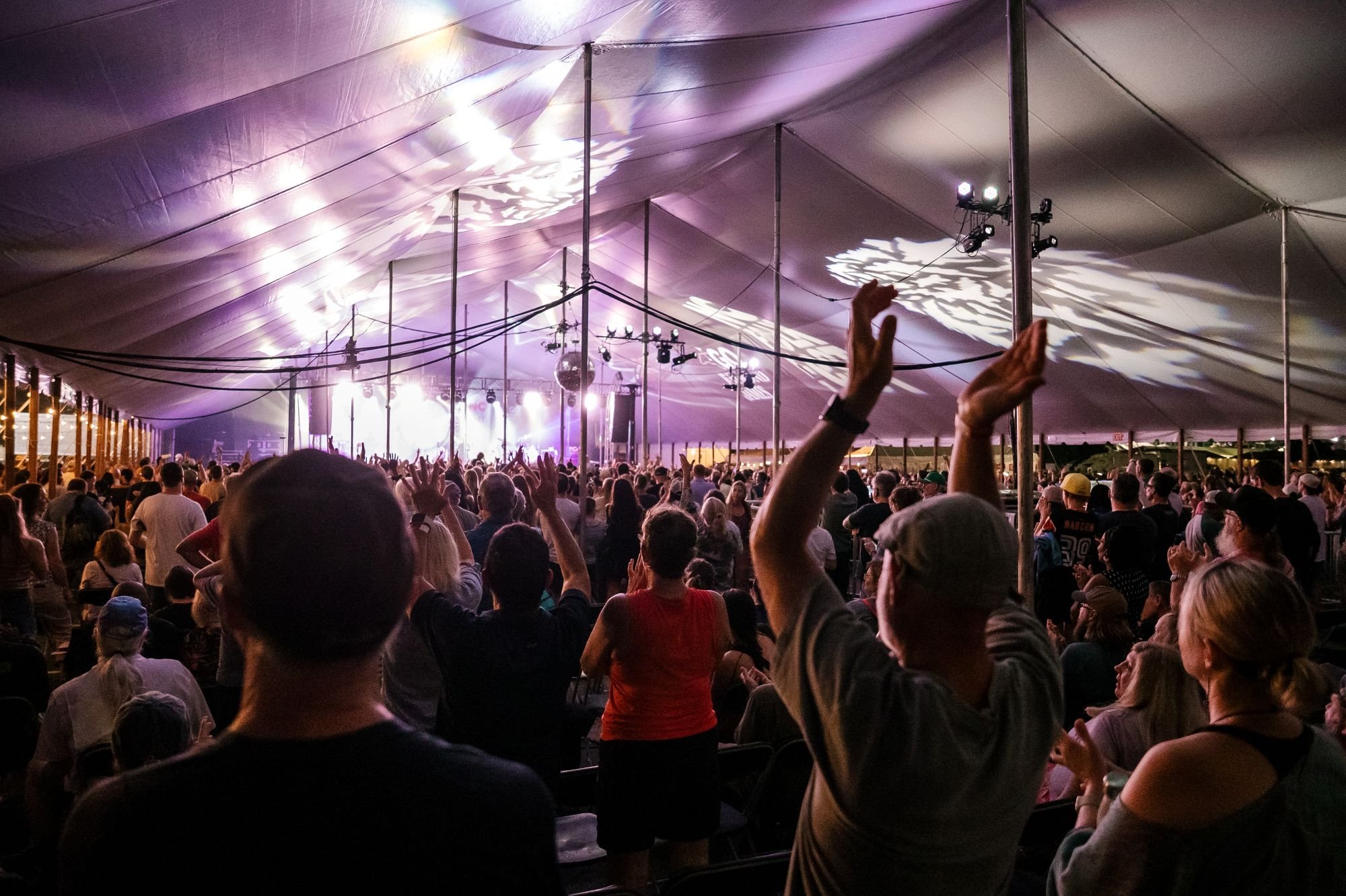 A large crowd of people enjoying the 2026 NC Folk Festival