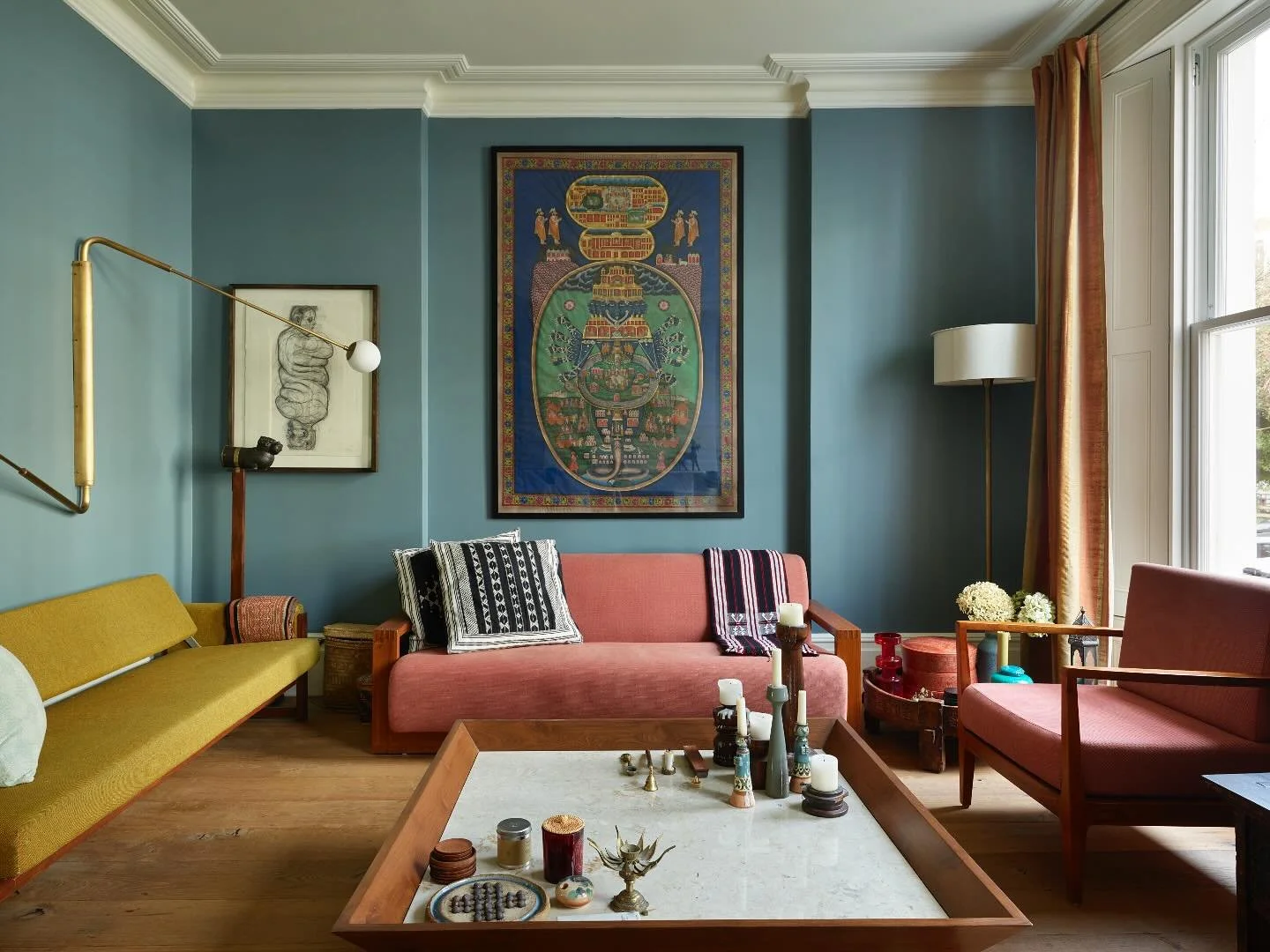 We restored the living room at our Hampstead project, retaining the original cornice, matching the original skirting boards, and rebuilding the traditional window shutters to honour the roots of this 170 year old townhouse.