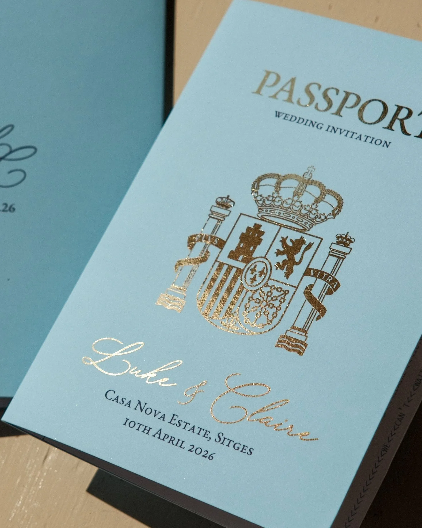 Gold foil passport wedding invitation