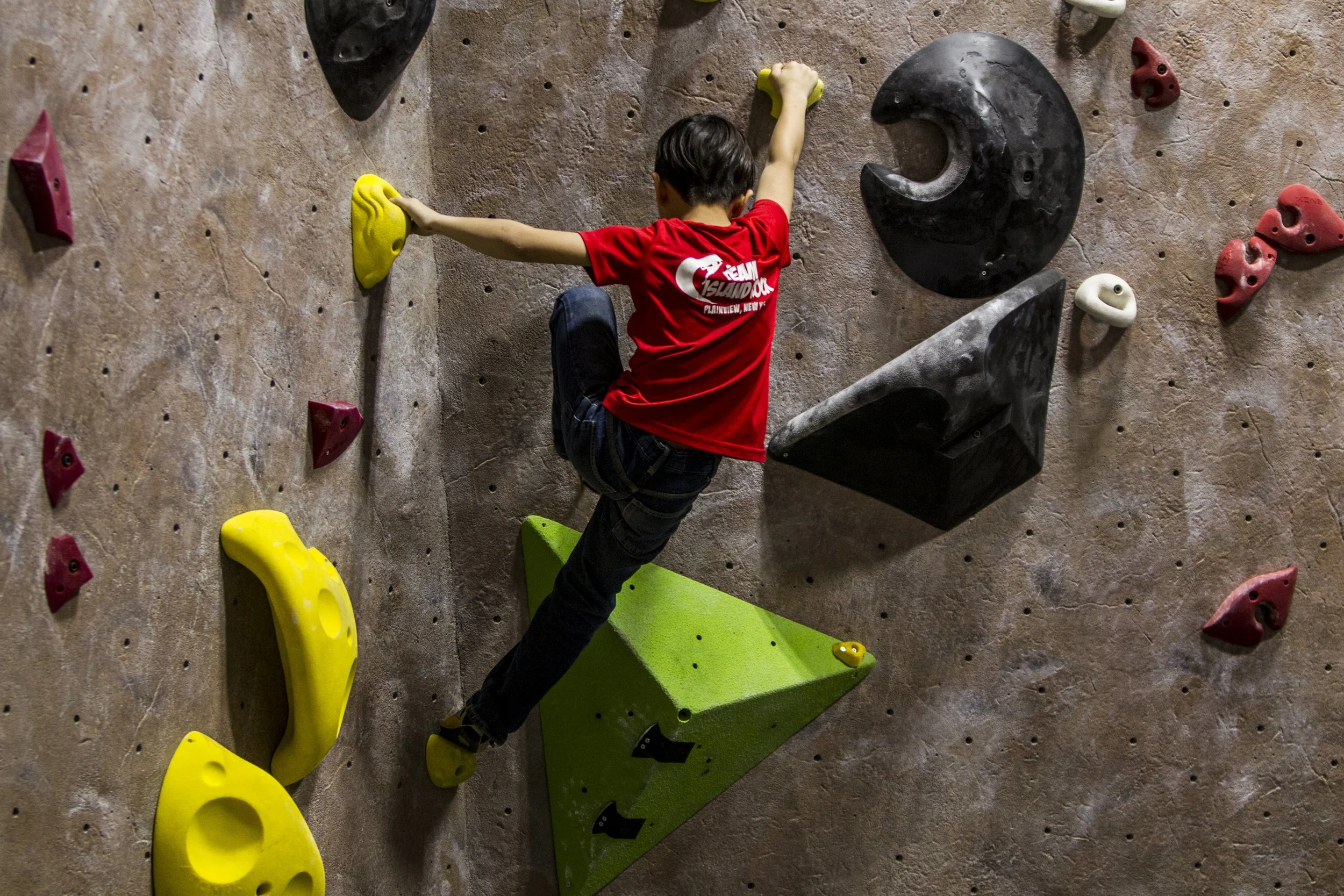 Youth Team program bouldering at Island Rock climbing gym on Long Island, NY - Youth Rock Climbing Team Training programs