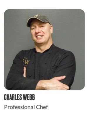 A man wearing a black chef's jacket and cap stands against a gray background with his arms crossed. The text below reads "CHARLES WEBB Professional Chef."