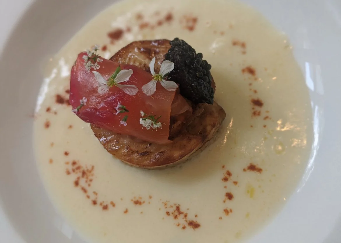 Danish cuisine celeriac with fermented asparagus sauce and caviar 