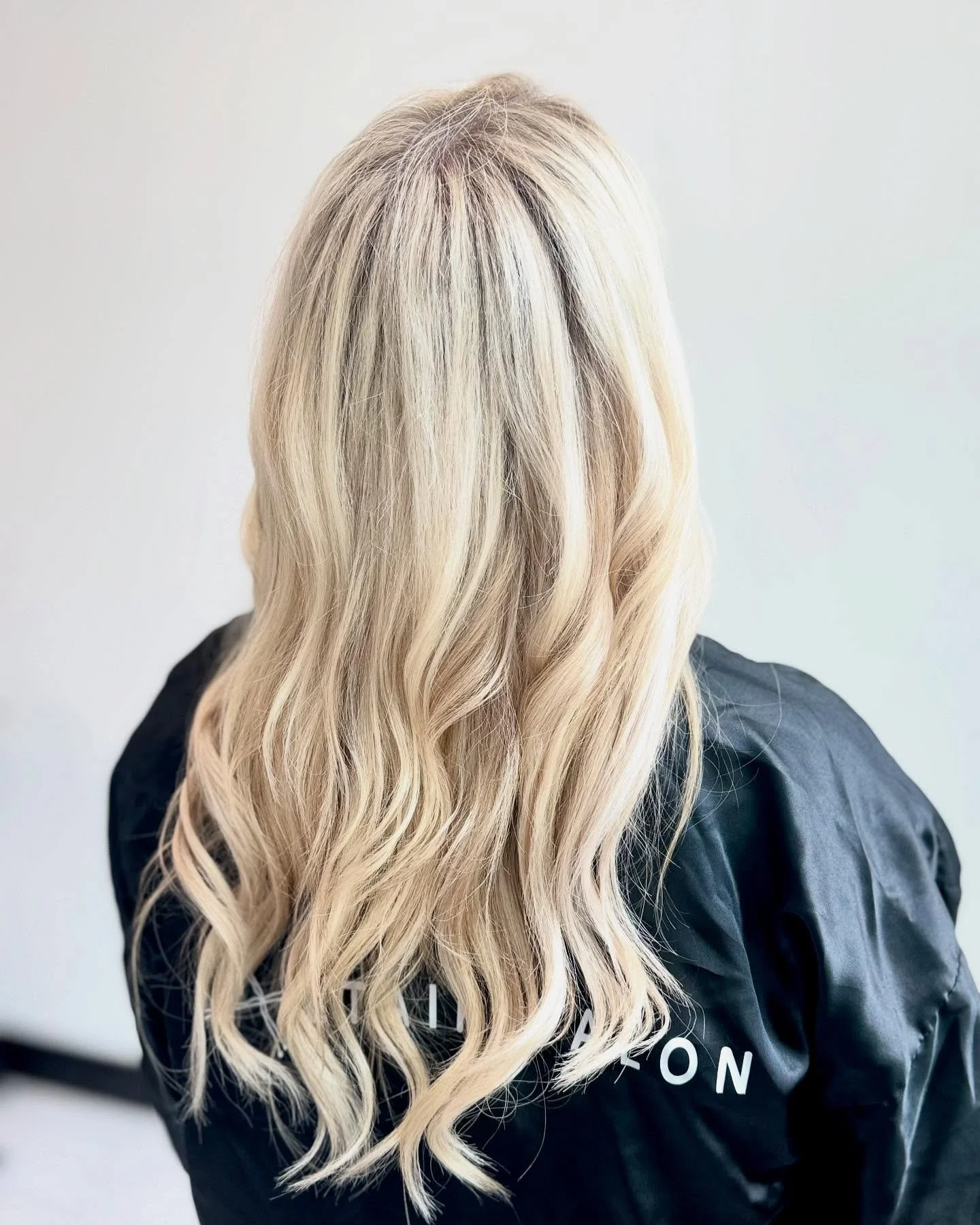 Captivate the room with the perfect amount of dimension in this bright vanilla blonde! 😍✨ Her healthy, luxurious hair screams &quot;I'm expensive&quot; without saying a word. Click the link in bio to find out how to achieve this stunning look for yo