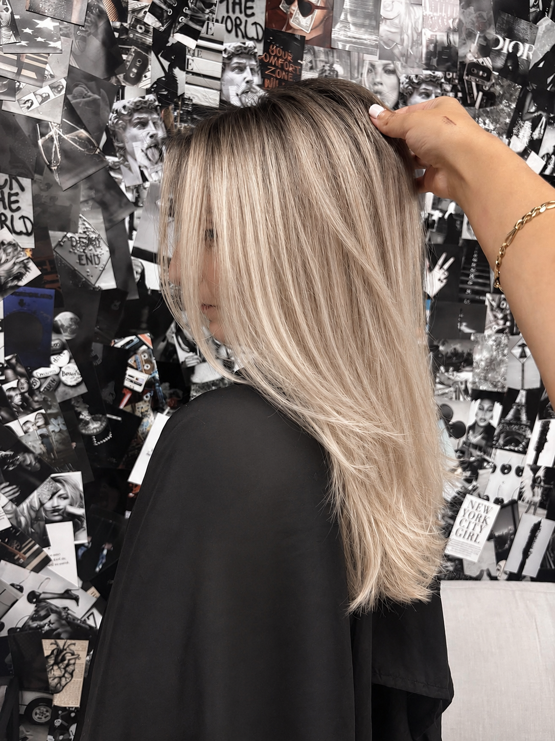 Blonde balayage with a seamless root blend and bright dimensional ends by Altair Salon, serving Port St. Lucie, FL. Customized lived-in blonde and balayage hair color for beautiful, low-maintenance results.