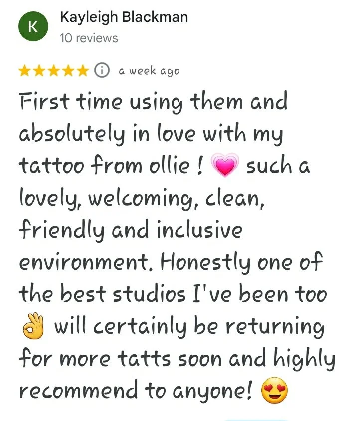 A five star Google review reading "First time using them and absolutely in love with my tattoo from ollie ! [vibrating heart emoji] such a lovely, welcoming, clean, friendly and inclusive environment. Honestly one of the best studios I've been to [ok