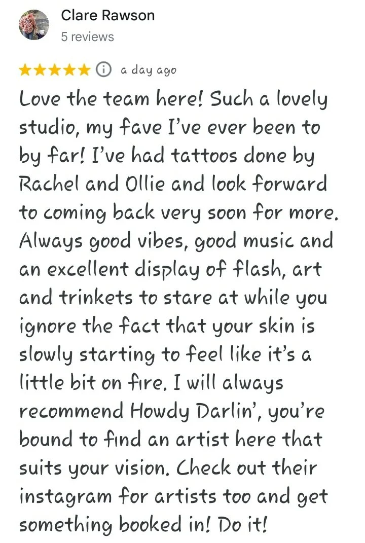 A five star Google review reading "Love the team here! Such a lovely studio, my fave I've ever been to by far! I've had tattoos done by Rachel and Ollie and look forward to coming back very soon for more. Always good vibes, good music and an excellen