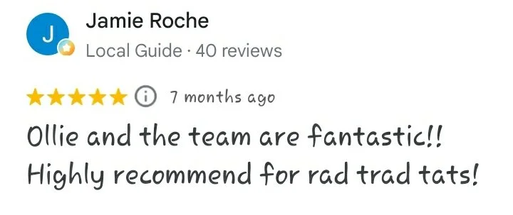 A five star Google review reading "Ollie and the team are fantastic!! Highly recommend for rad trad tats! - Jamie Roche"