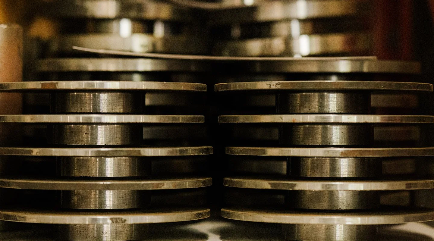 Close-up of metal discs stacked on top of each other.