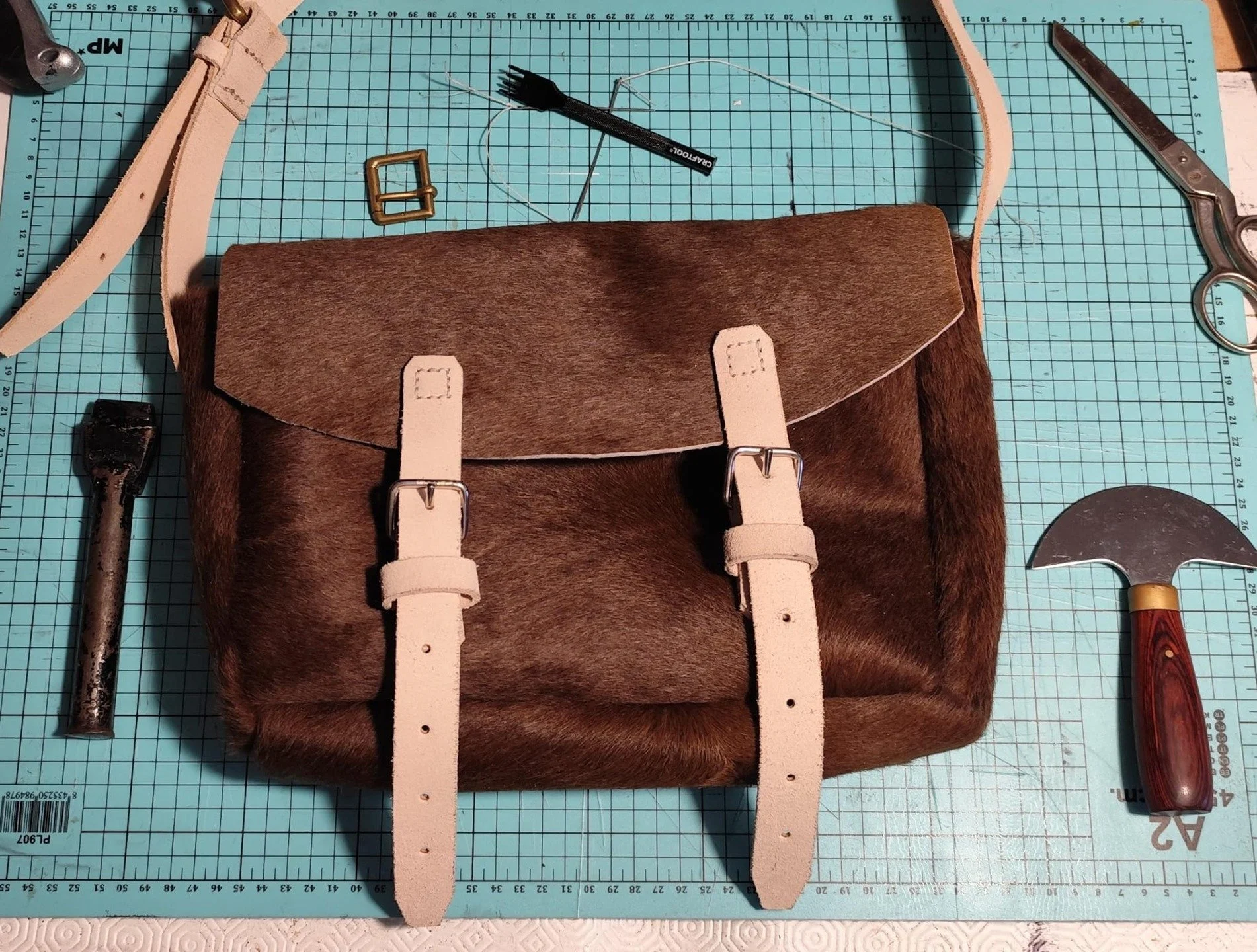 Prussian Tornister, fresh from whe workbench. Cow hide with buff leather straps. Unlined. I can whiten the buff and line the bag upon request.
Very fun project to take on, I've got two more on the bench ready to complete! Any feedback would be positi