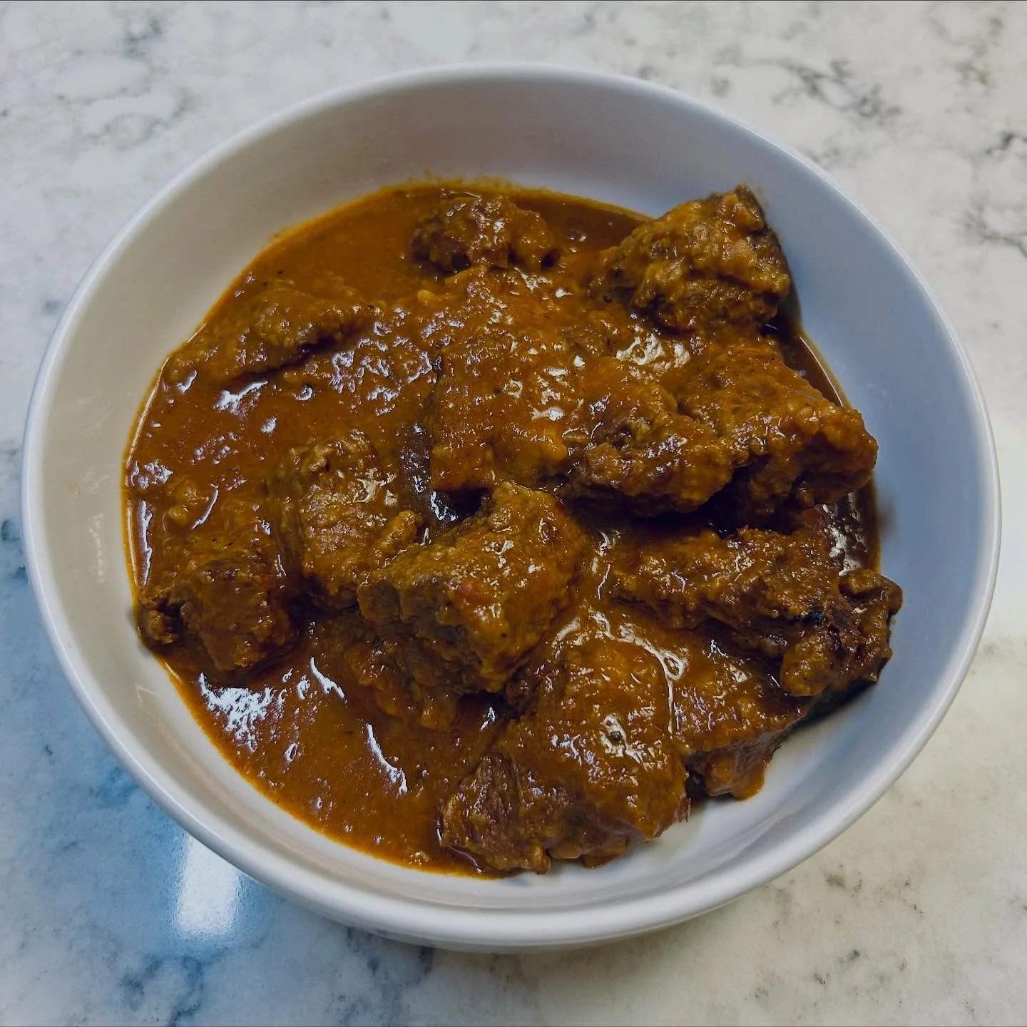 Chile Colorado. 🌶️🥩 Swipe ⬅️ to 👀 more 📸
-
1) Make the sauce. Cut the tops off and shake the seeds out of the dried chiles (2 de arbol, 1 pack of ancho, and 1 pack of guajillo). Toss into a pot with 3 cups of water, 1 yellow onion, and 4 cloves o