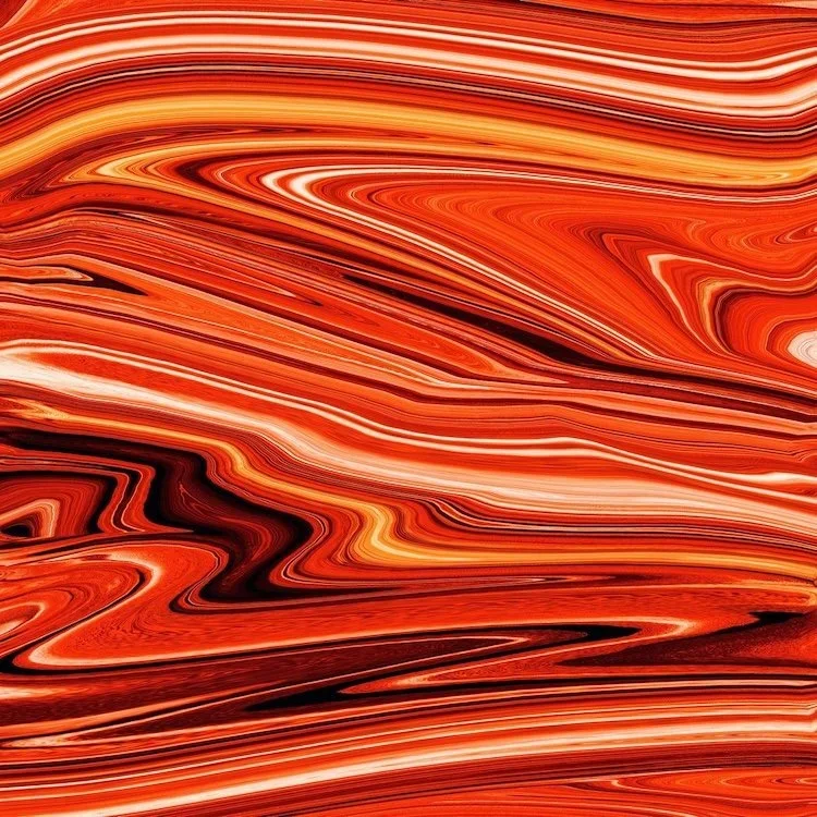 Abstract swirl of red, orange, white, and black colors resembling marble or fluid paint.