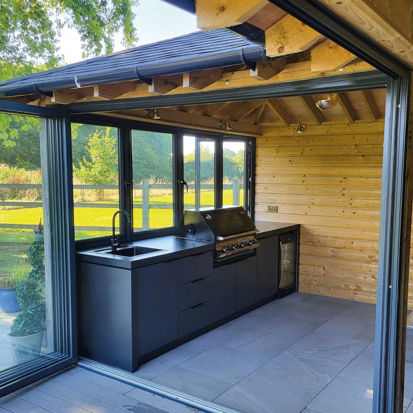 Cabinex Outdoor Kitchens are crafted with a perfect balance of luxury, durability, and functionality. Features include elegant, sleek countertops, generous storage solutions, and modern appliances, all engineered for seamless performance.

Complement