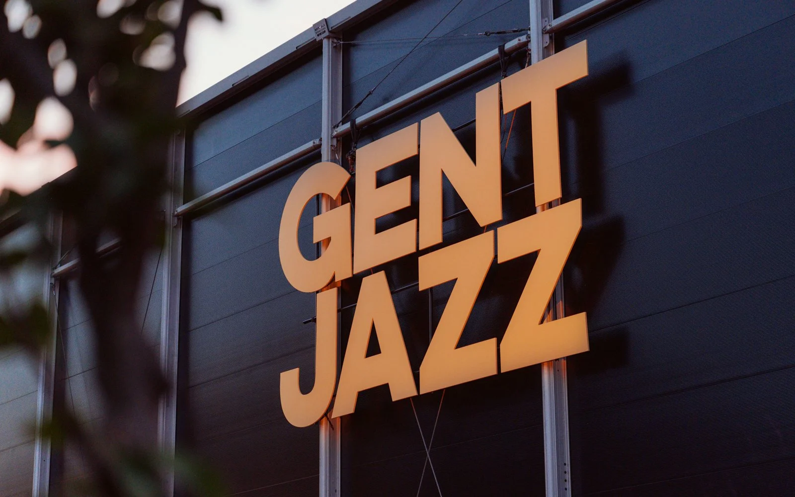 Scenic construction for music festival combining logo structure and interactive installation for Gent Jazz