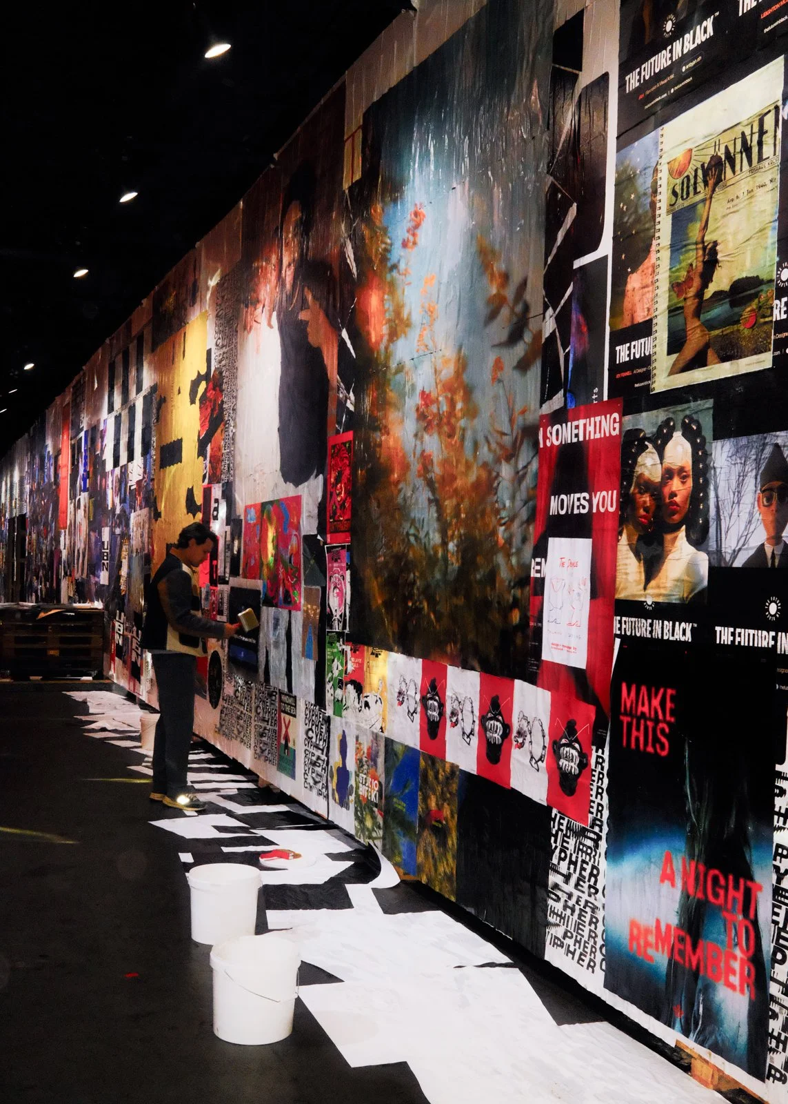 Custom-built 74 meter wall designed for visitor interaction and evolving print artwork during creative festival
