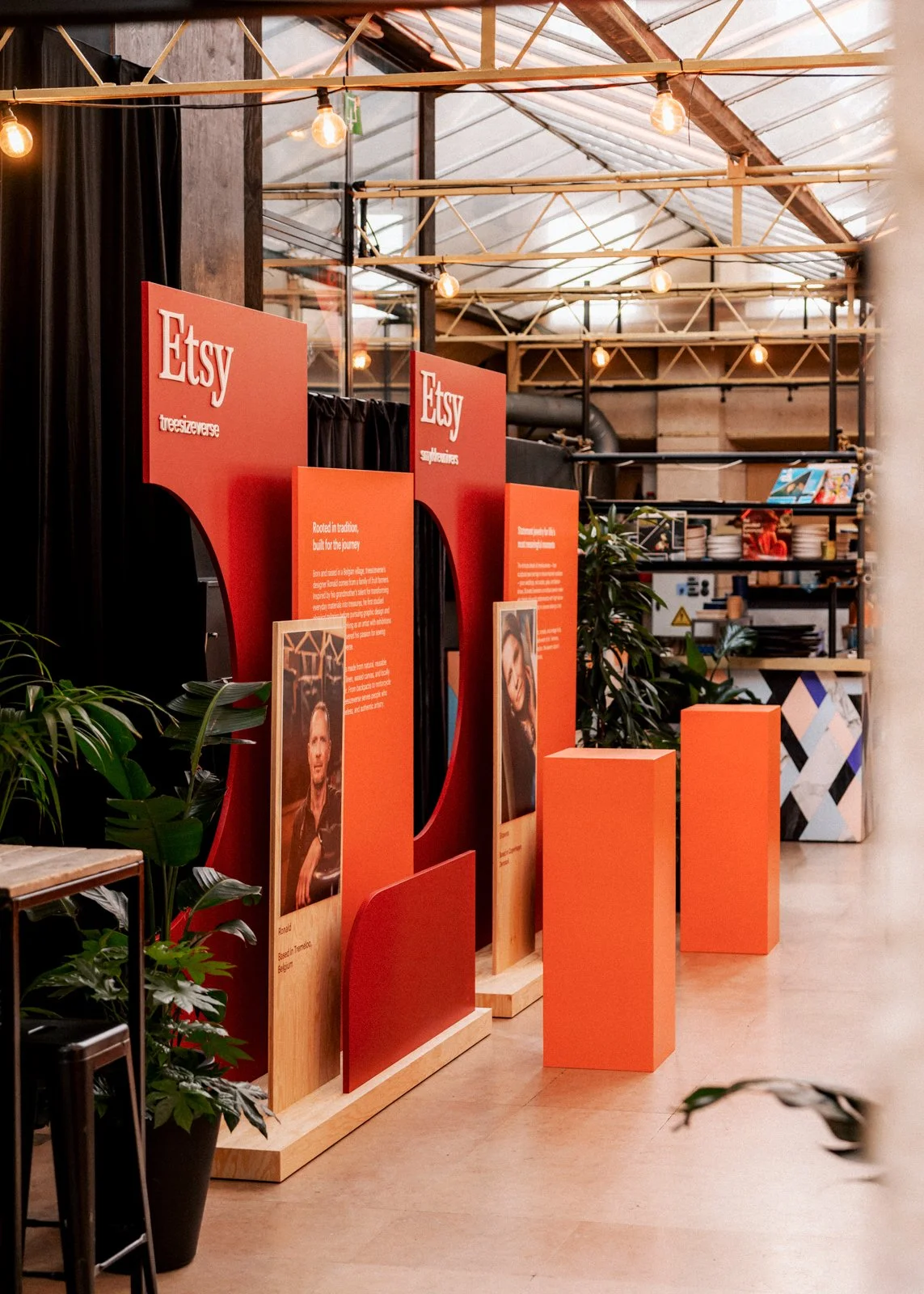 Custom-built exhibition stands with interchangeable backdrops highlighting diverse handmade products