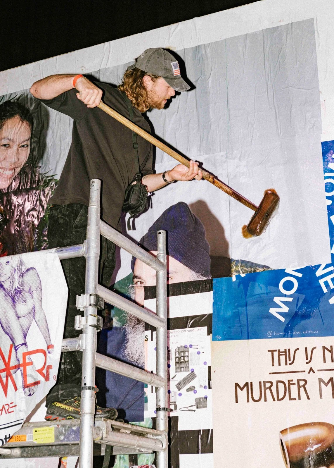 Large-scale print wall installation with interactive collage concept for Us By Night festival at Waagnatie