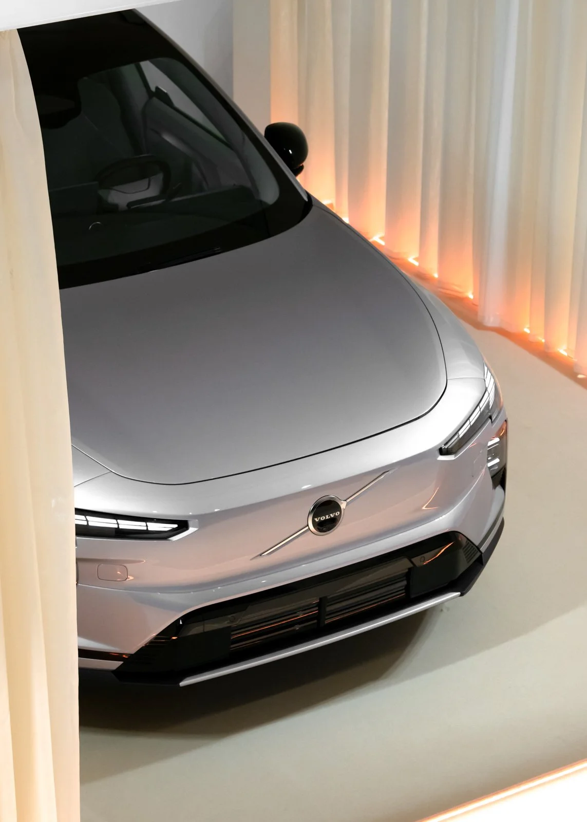 Volvo EX60 dealership activation with sunrise light reveal concept