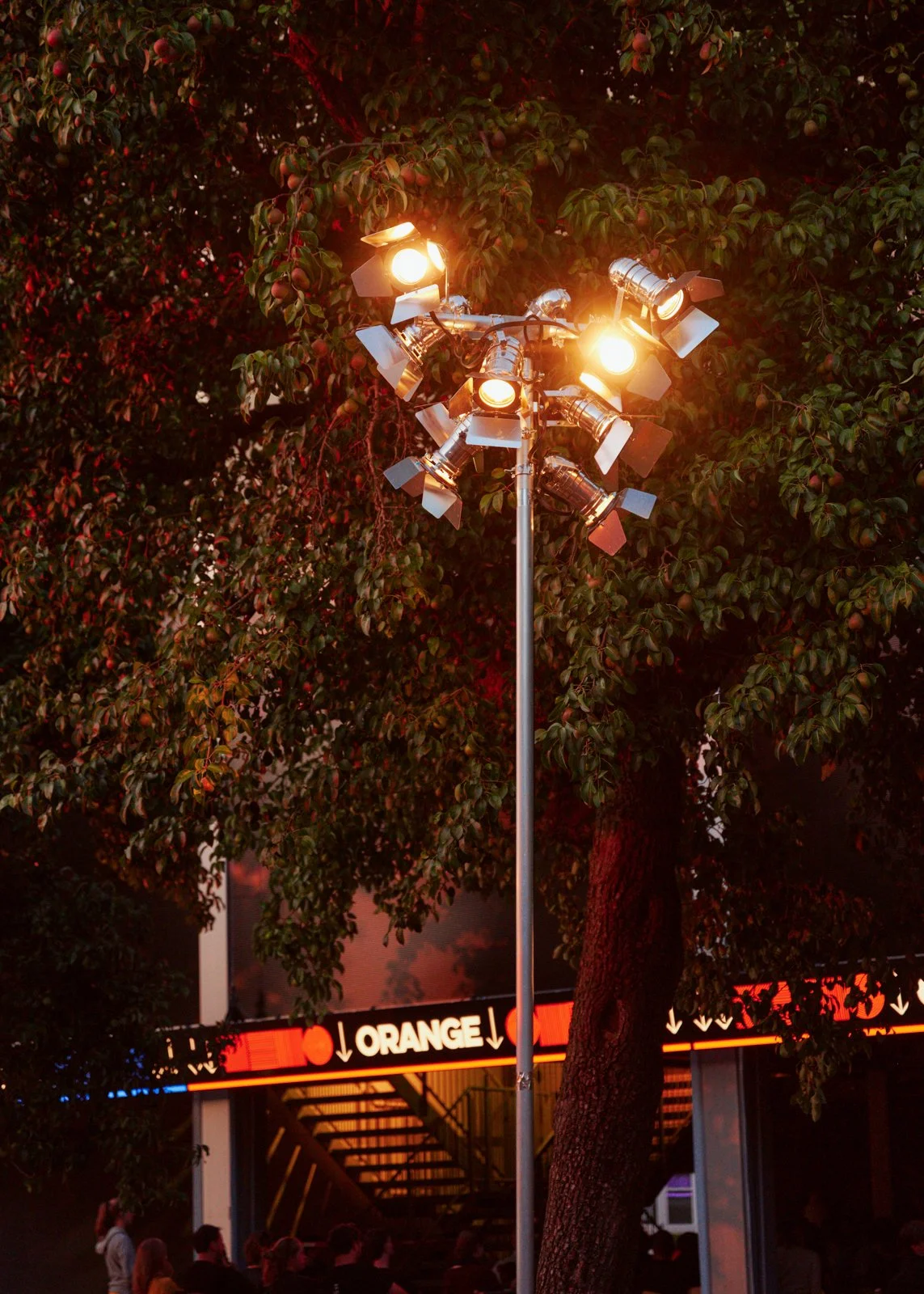 Outdoor festival scenography combining bold entrance feature and playful interactive element at De Bijloke